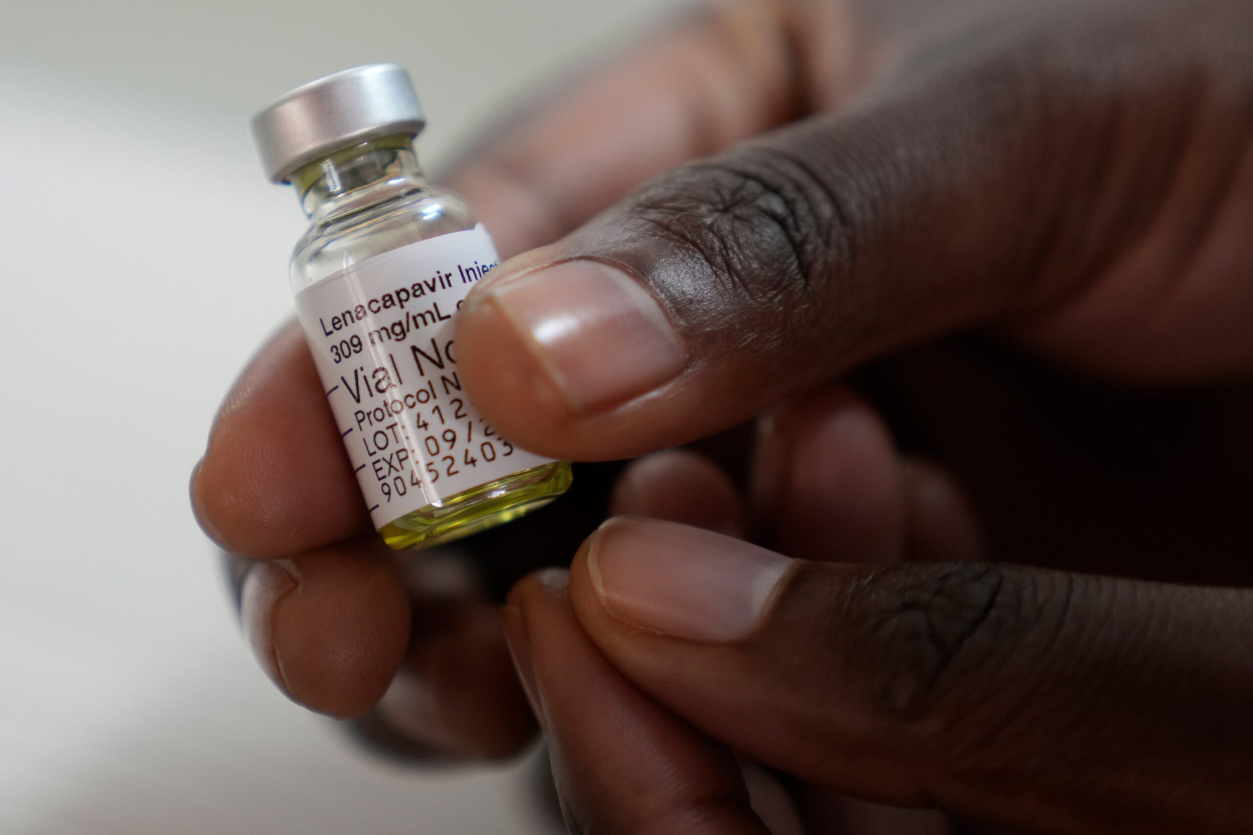 FILE - A pharmacist holds a vial of lenacapavir, at the Desmond Tutu Health Foundation's Masiphumelele Research Site, in Cape Town, South Africa, July 23, 2024. (AP Photo/Nardus Engelbrecht)